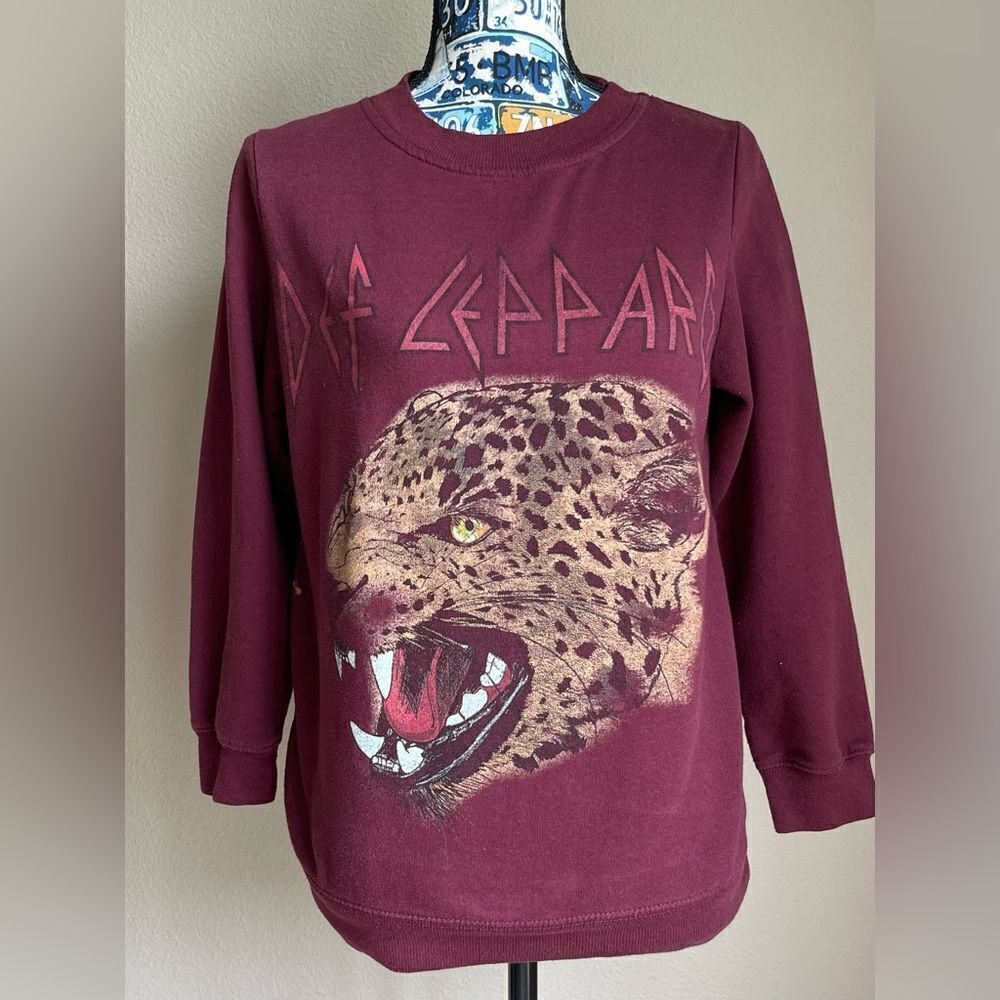 Burgundy Def Leppard tiger sweatshirt.